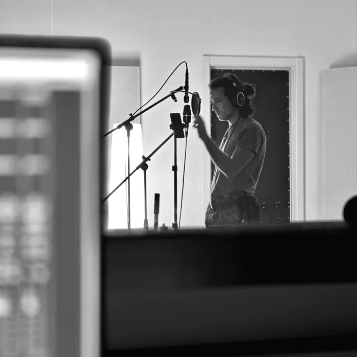 Vocal take through the control room glass