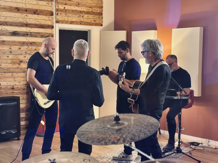 Band tracking together in the live room